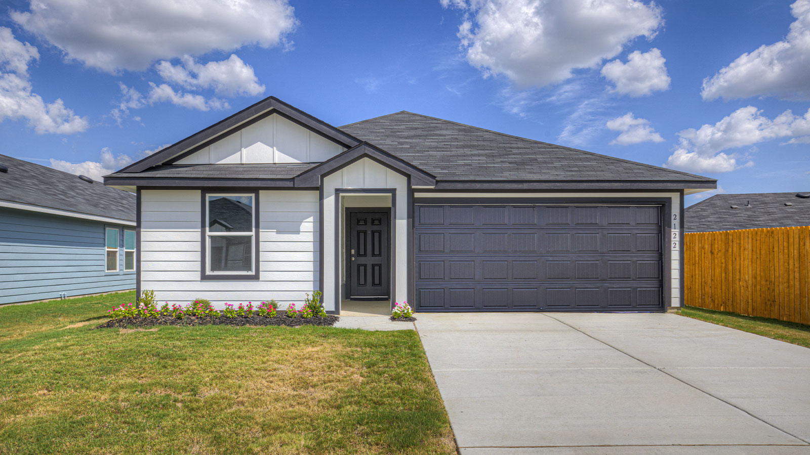 Single-story with farmhouse exteriors.