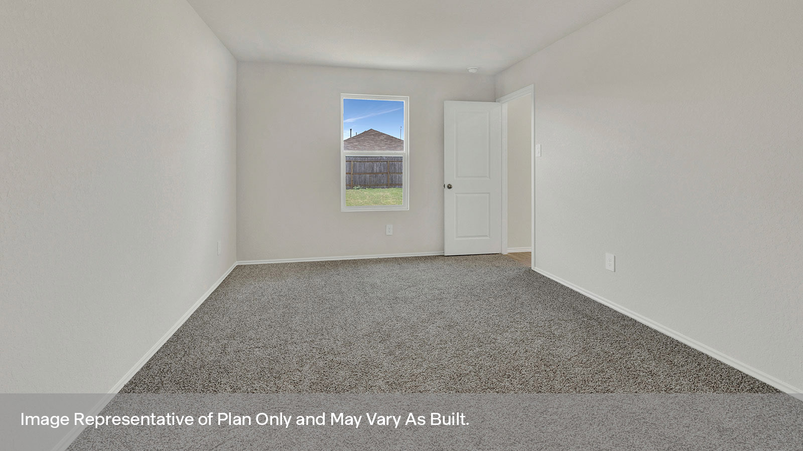 Main bedroom with carpeting and one window.