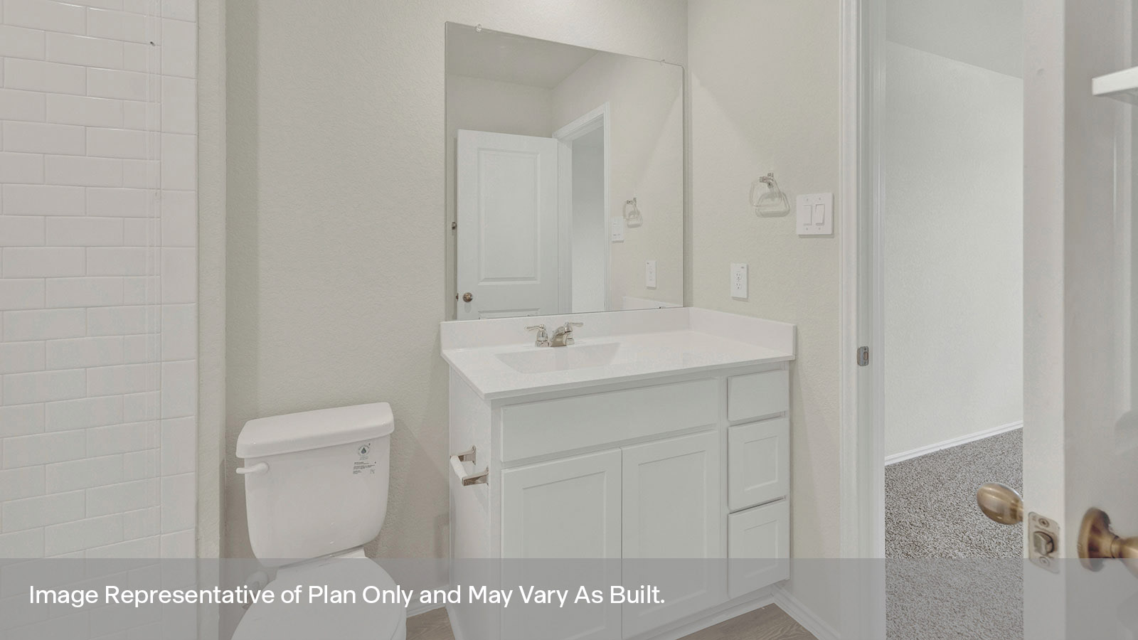 Main bathroom with vanity and toilet.