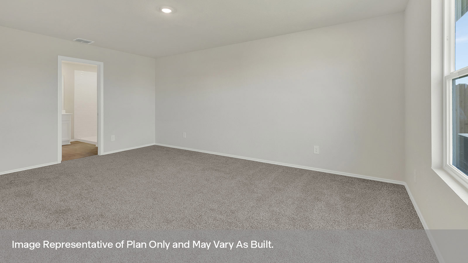 Main bedroom with carpeting and one window.