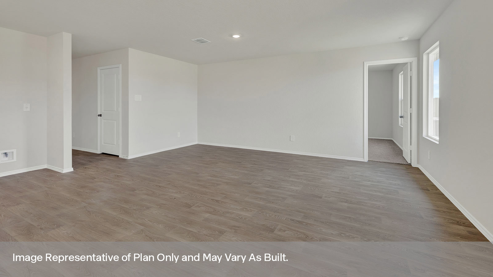 Living room with vinyl flooring.