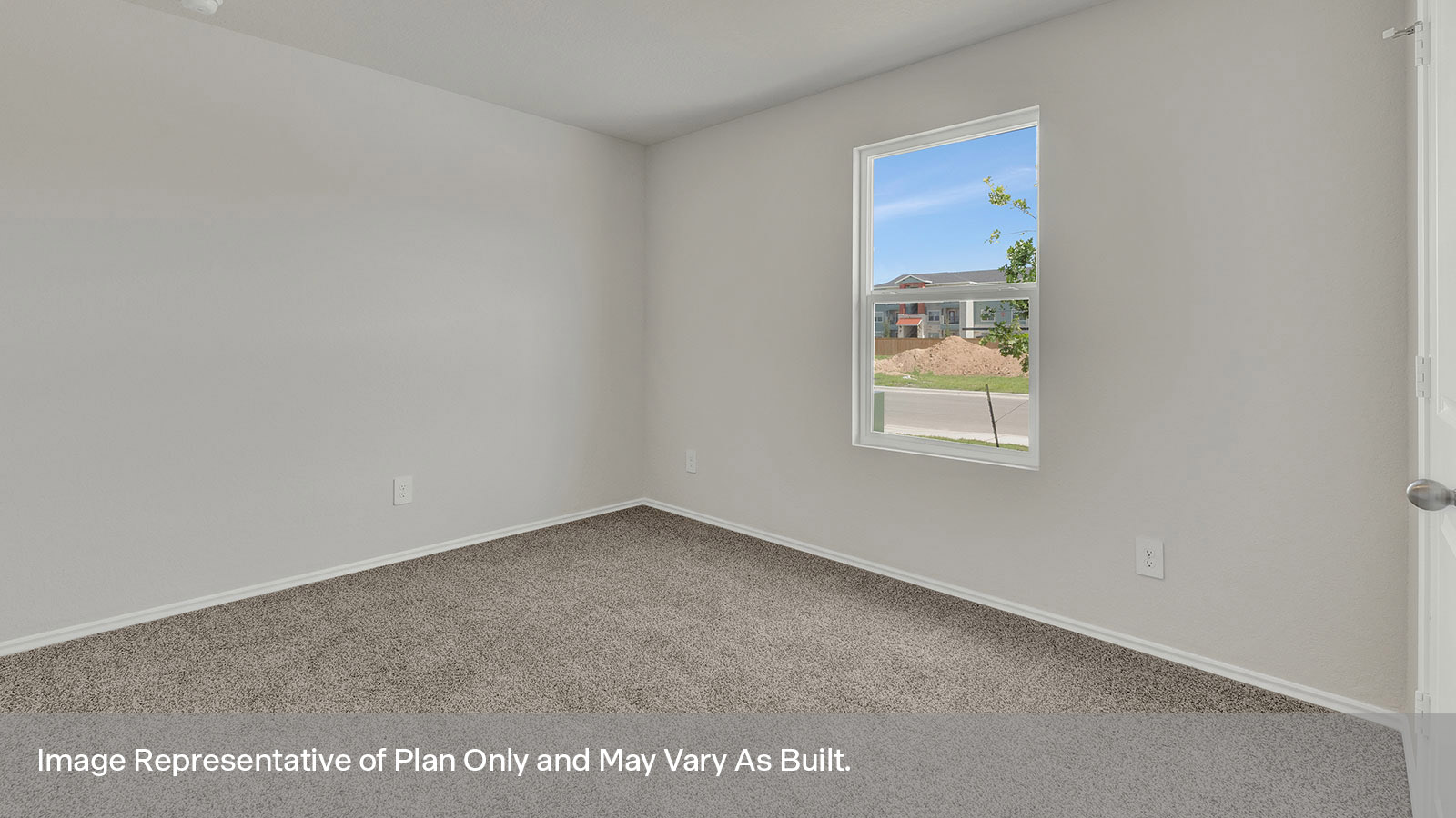 Front bedroom with carpeting and one window.