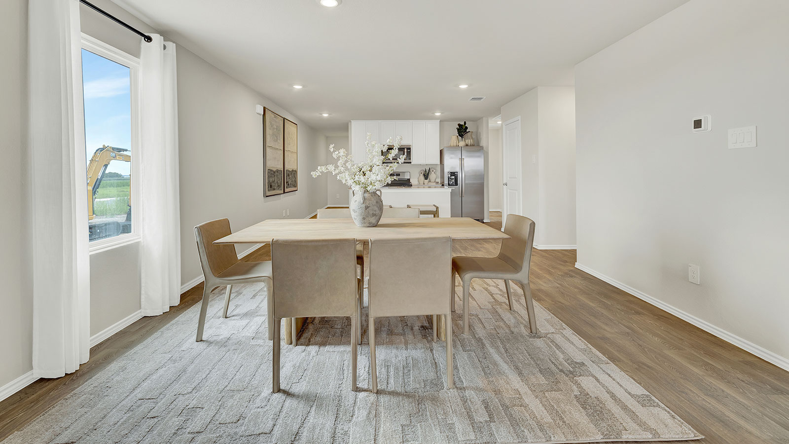 Dining room opening to the living room.