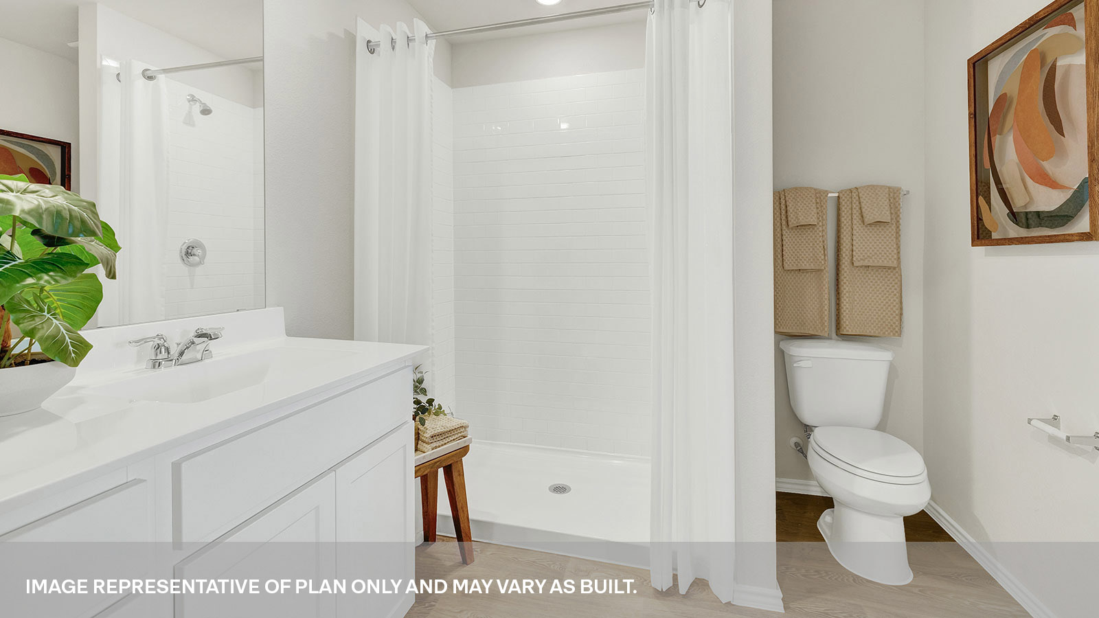 Main bathroom with shower, toilet, and sink.
