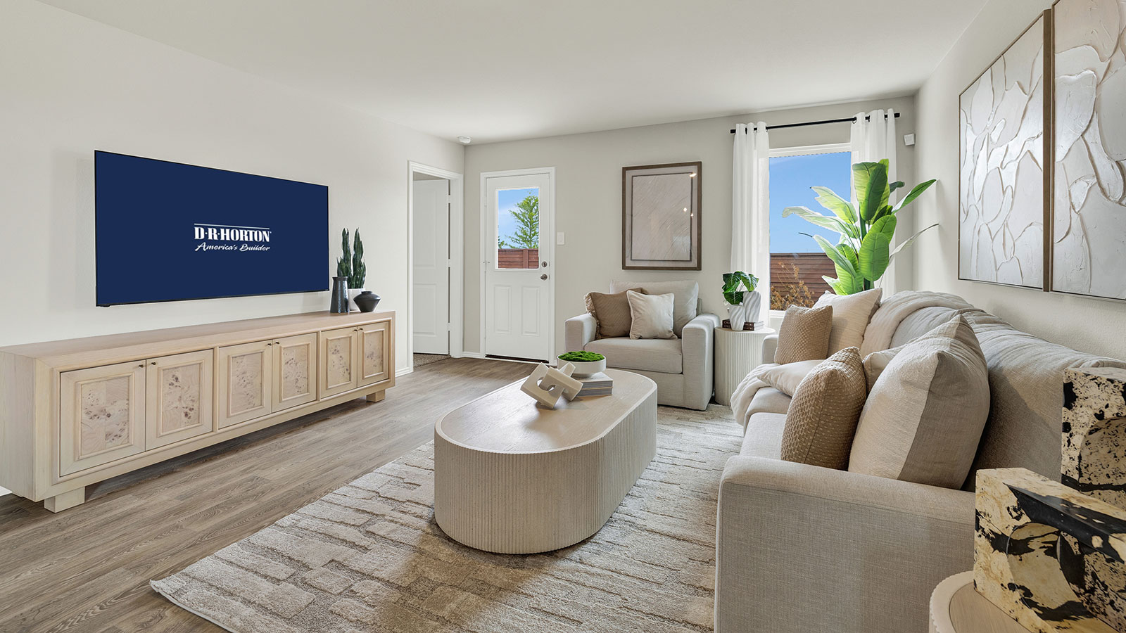 Living room with vinyl flooring, window, and a half lite exterior door.