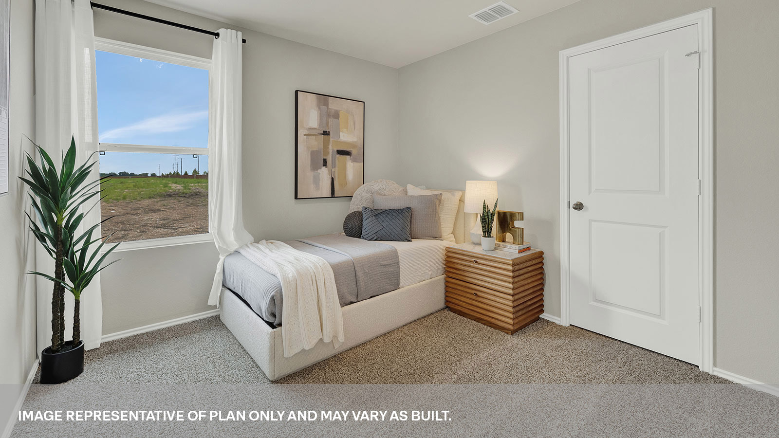 Bedroom with carpeting and one window.