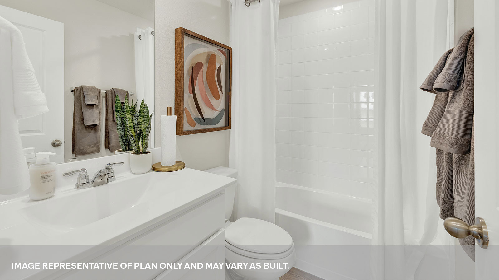 Hall bathroom with single-sink vanity, toilet, and tub.