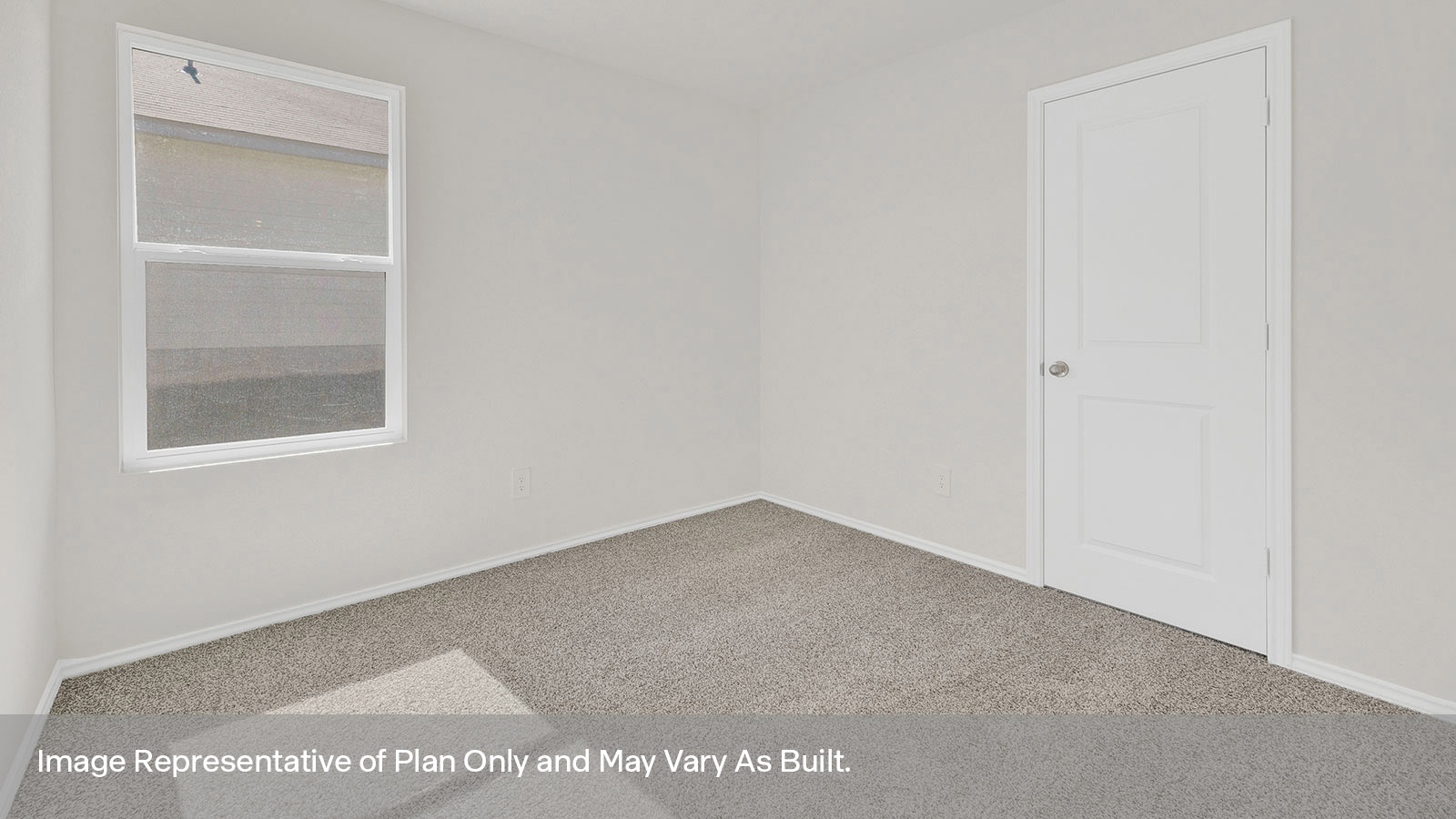 Hall bedroom with carpeting and one window.
