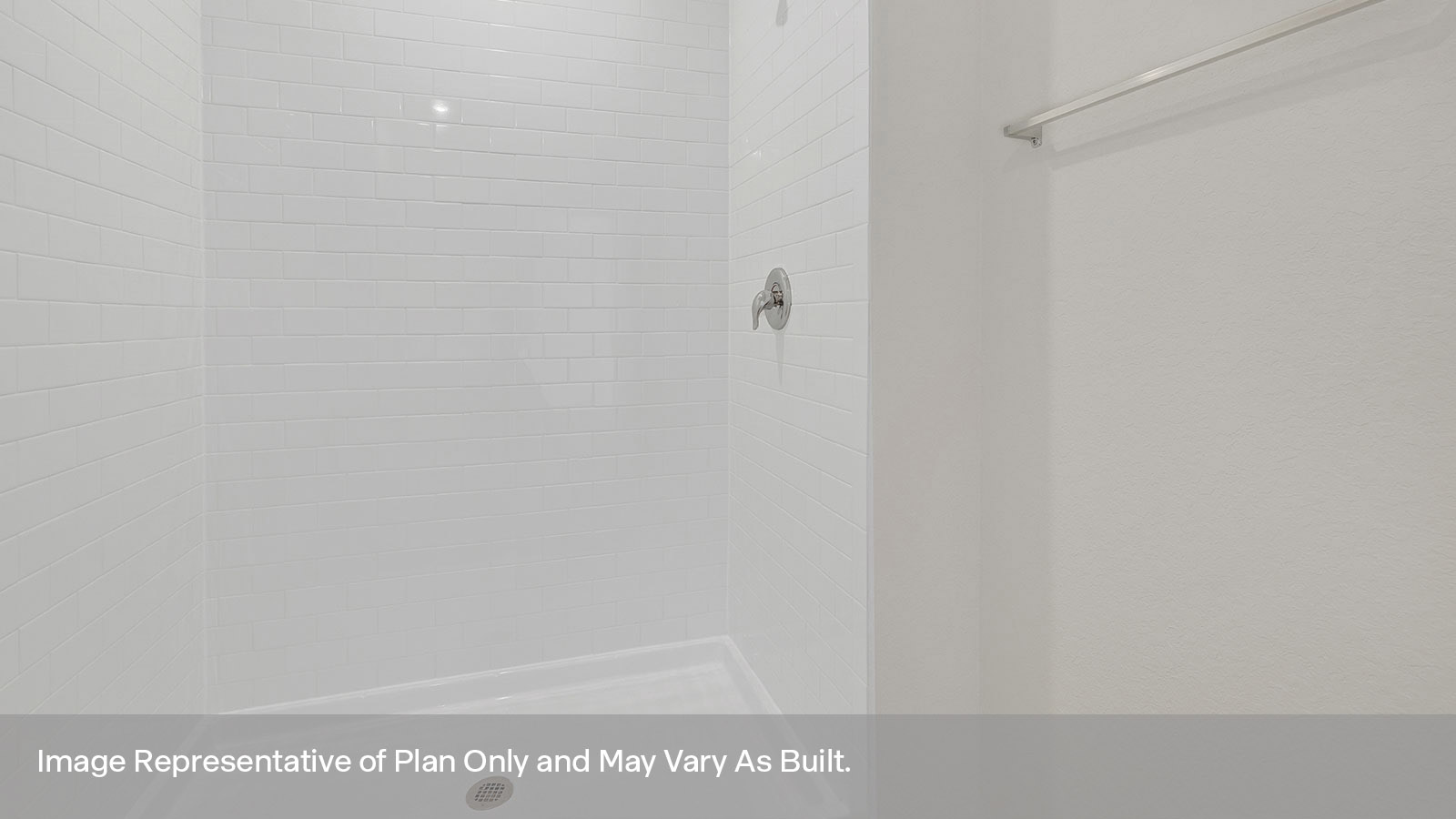 Main bathroom with vanity, toilet, and tiled shower.