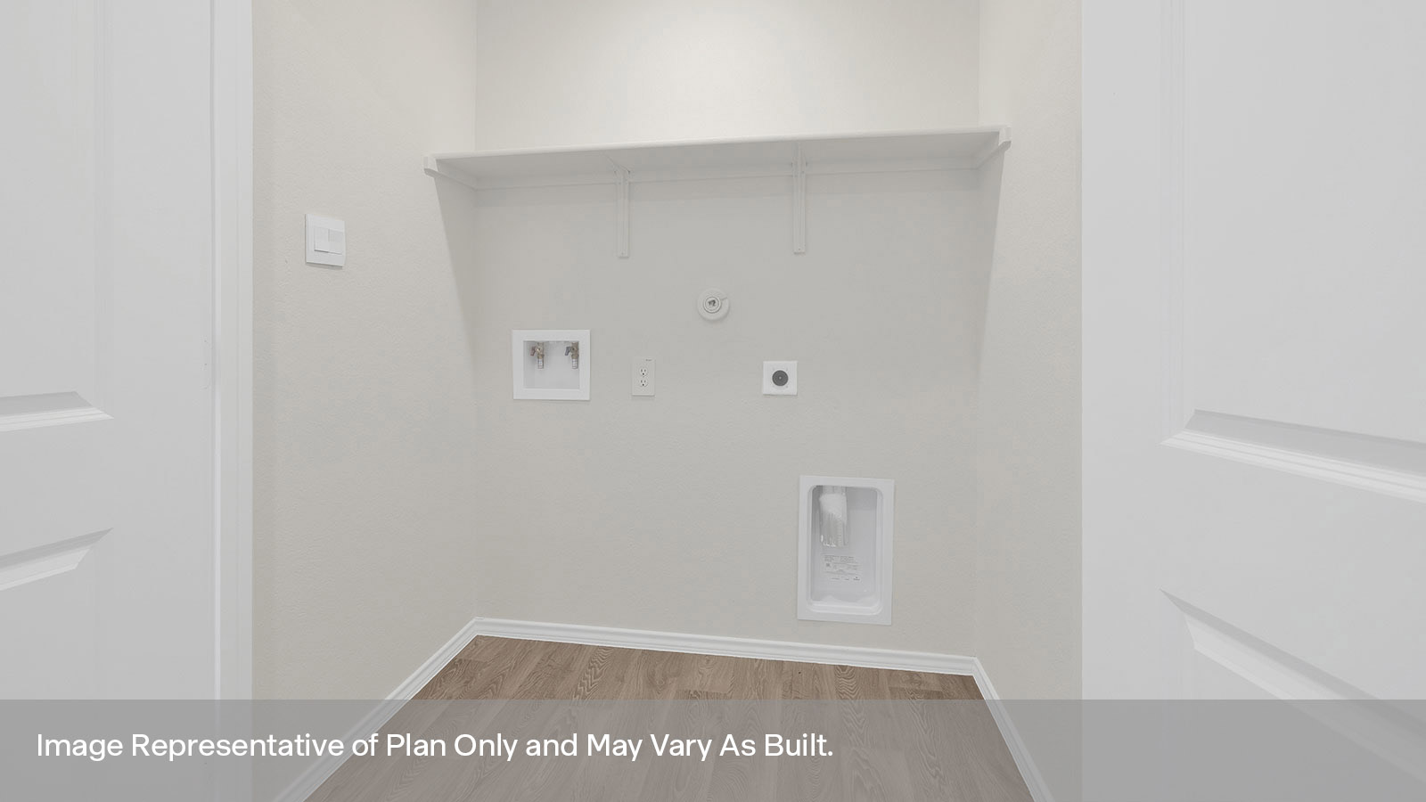 Laundry room with washer/dryer connection and wooden shelving.