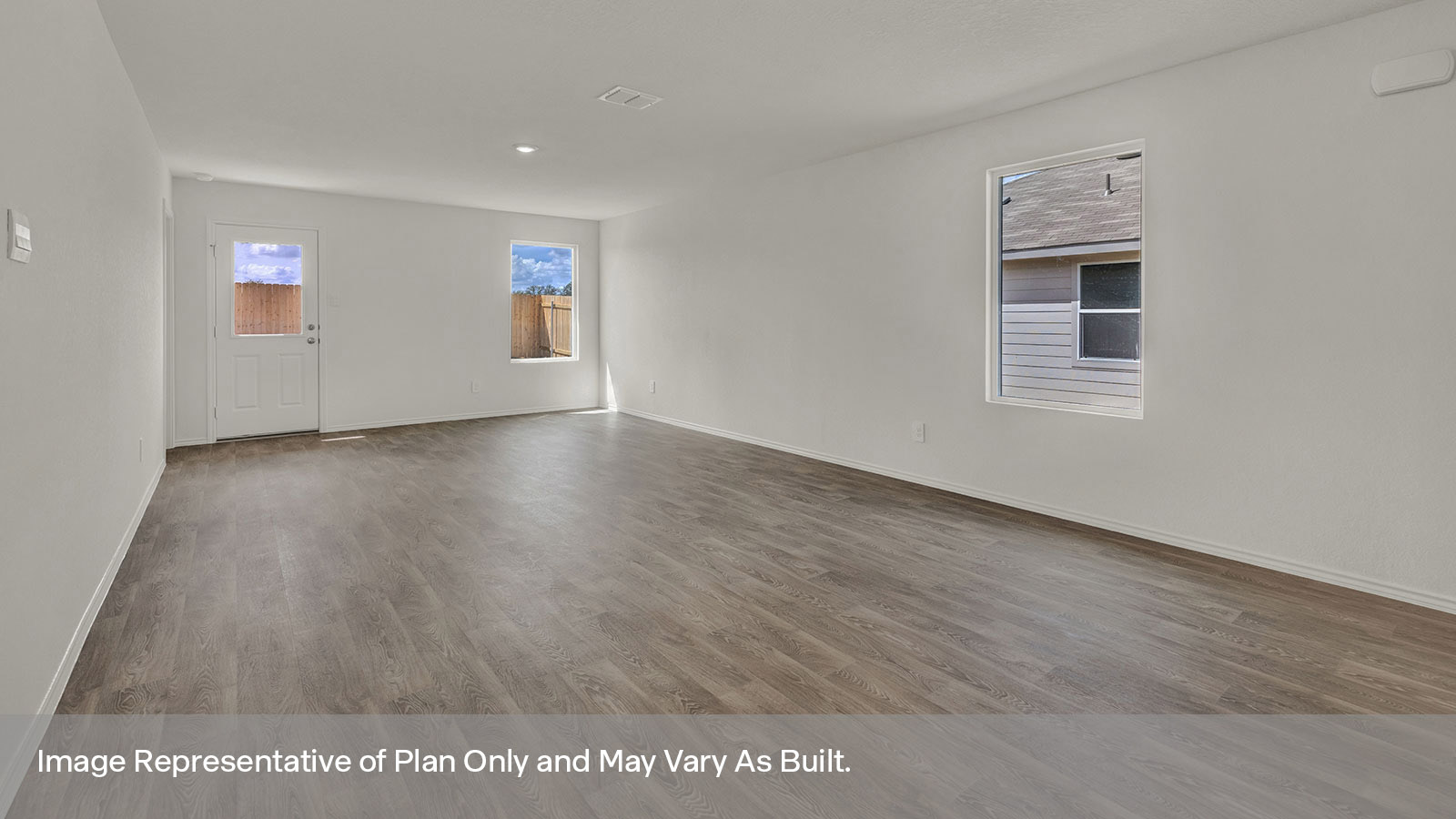 Living room with vinyl flooring, one window, and  half lite exterior door.