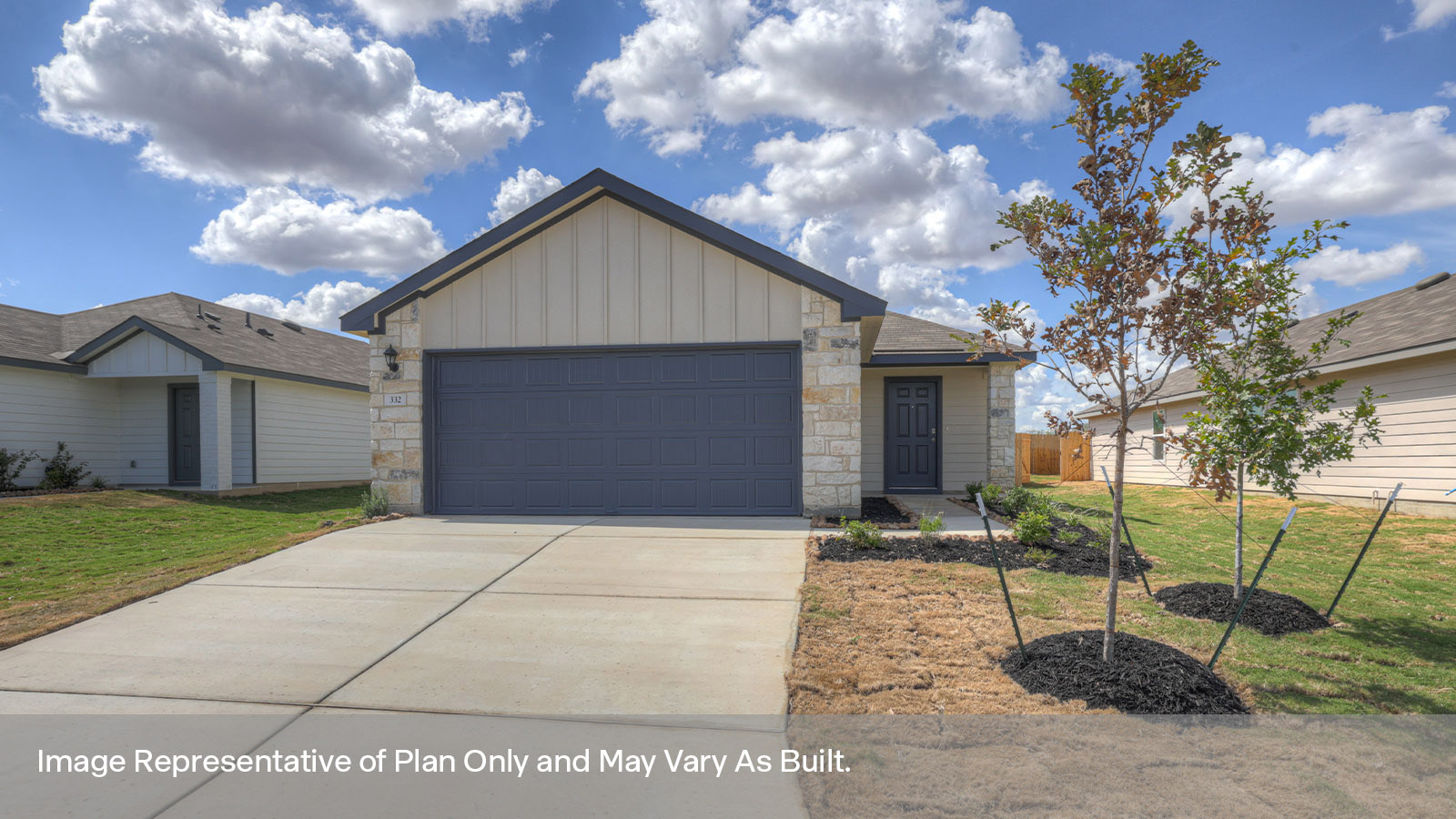 Single-story farmhouse with 2 car garage.