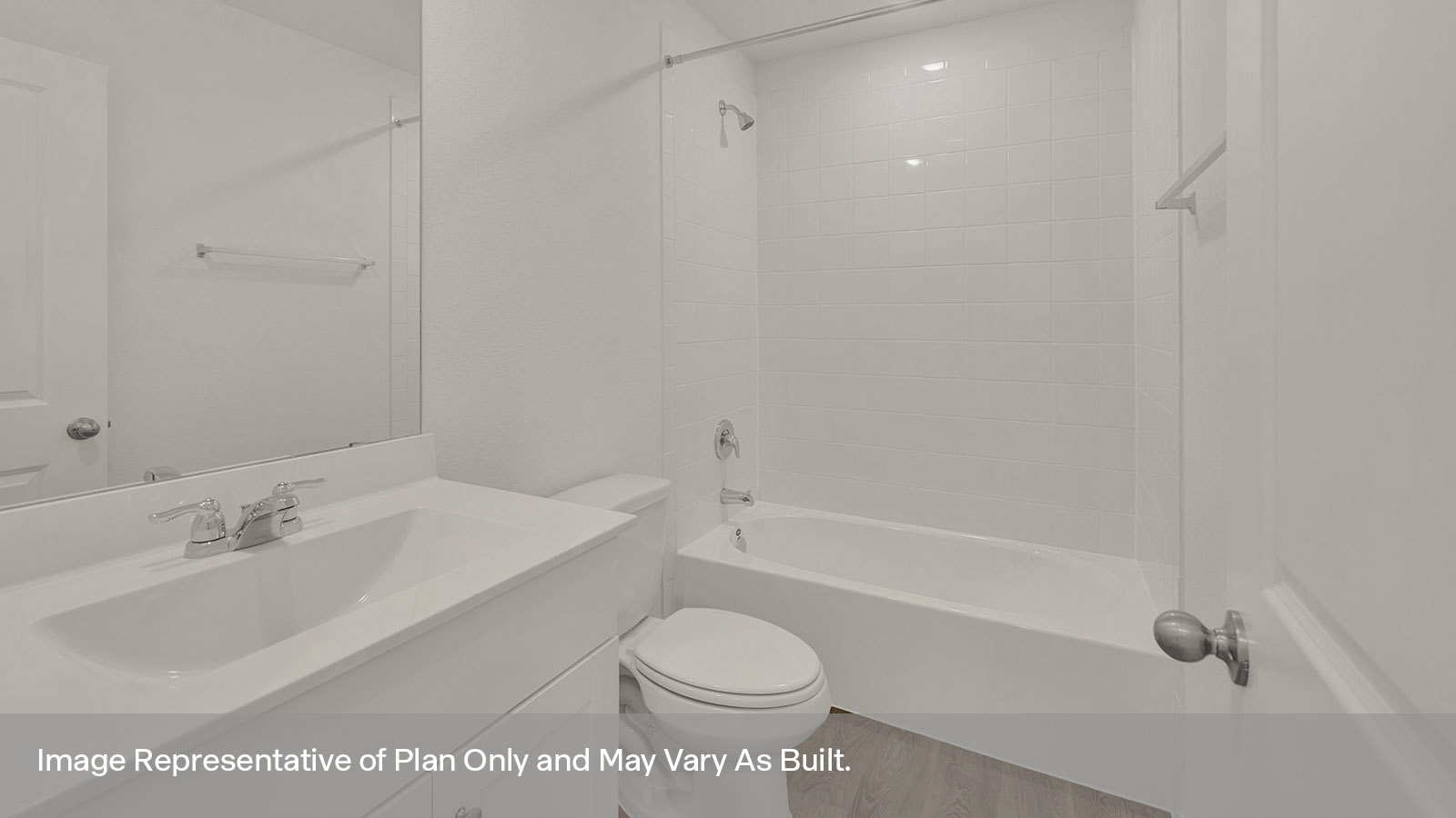 Hall bathroom with tub with tile surround, toilet, and single-vanity sink.