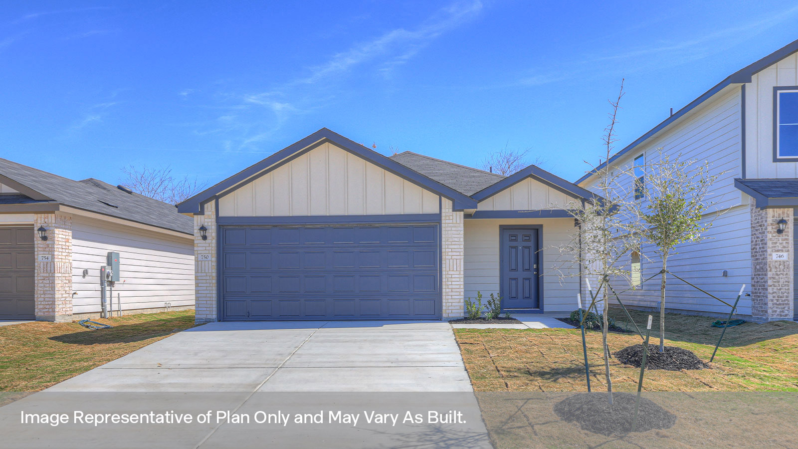 Single-story farmhouse with 2 car garage.