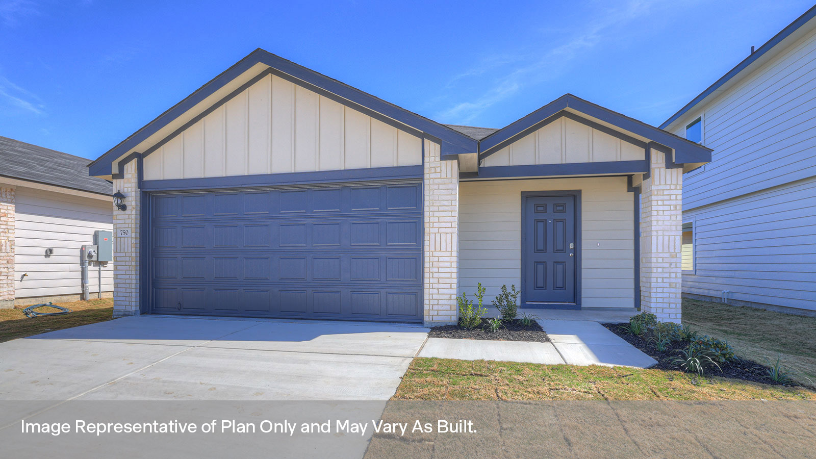 Single-story farmhouse with 2 car garage.