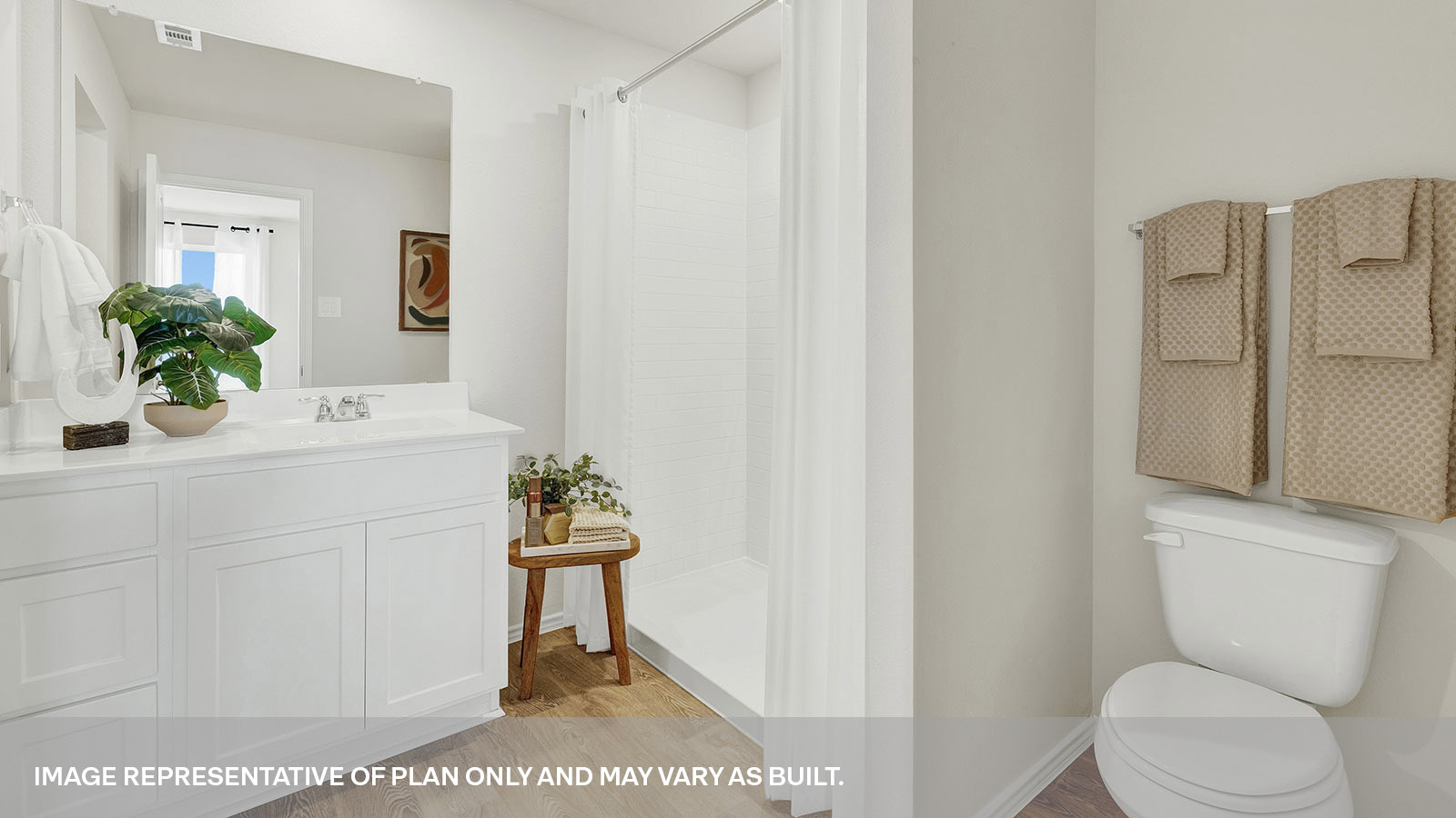 Main bathroom with shower, toilet, and sink.