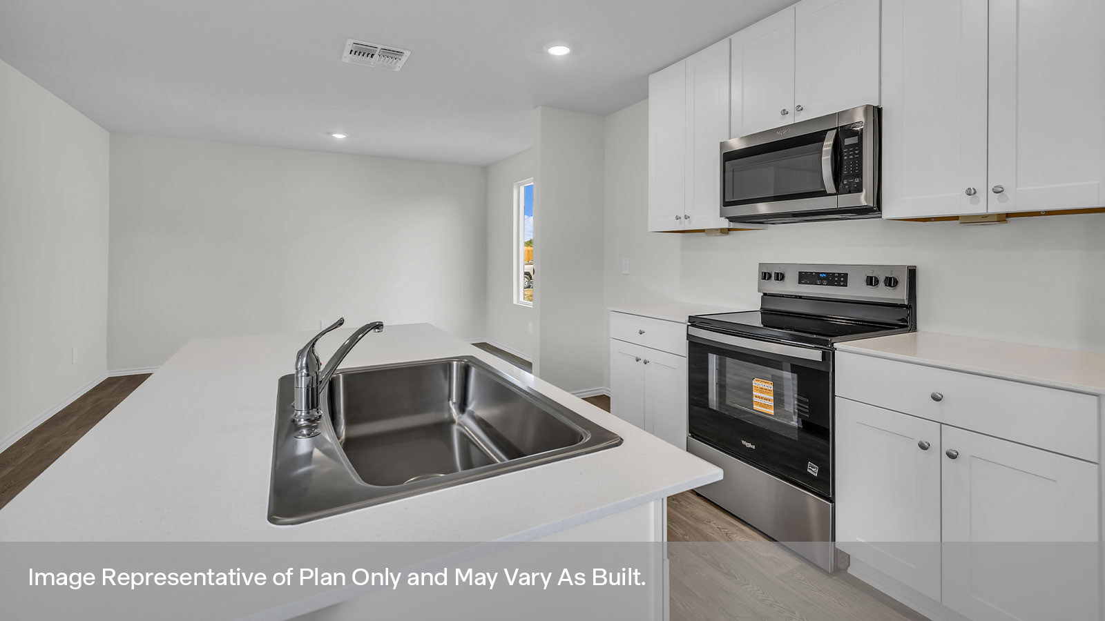 Kitchen with island and stainless appliances