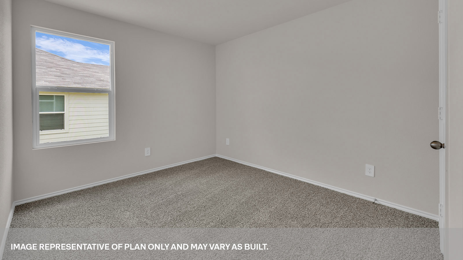 Secondary bedroom with carpeting and one window.