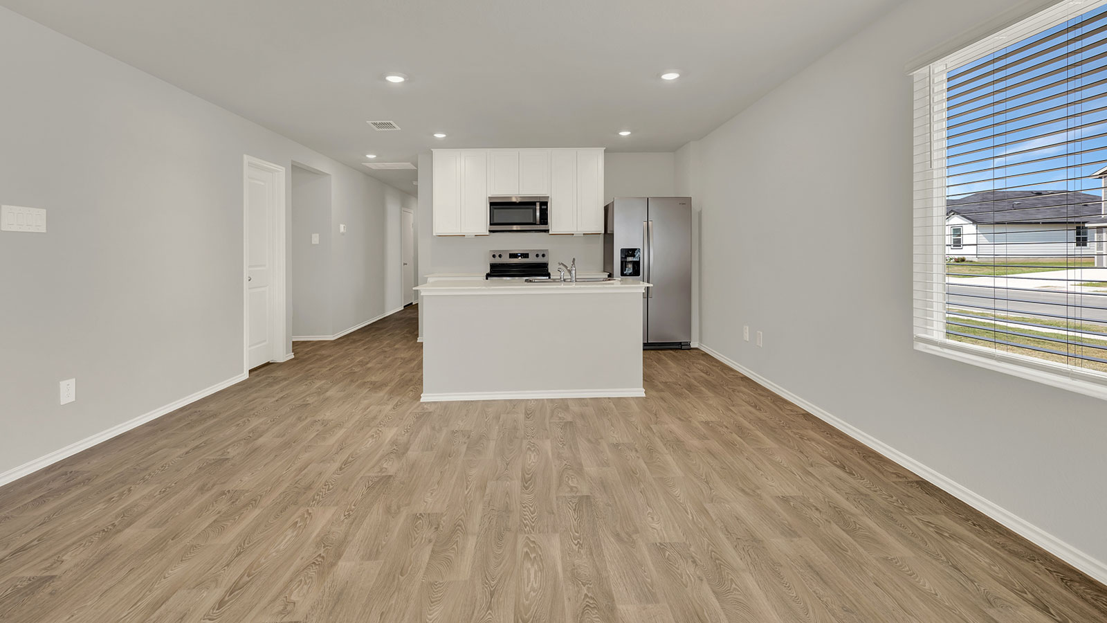 Dining room opening to the kitchen.