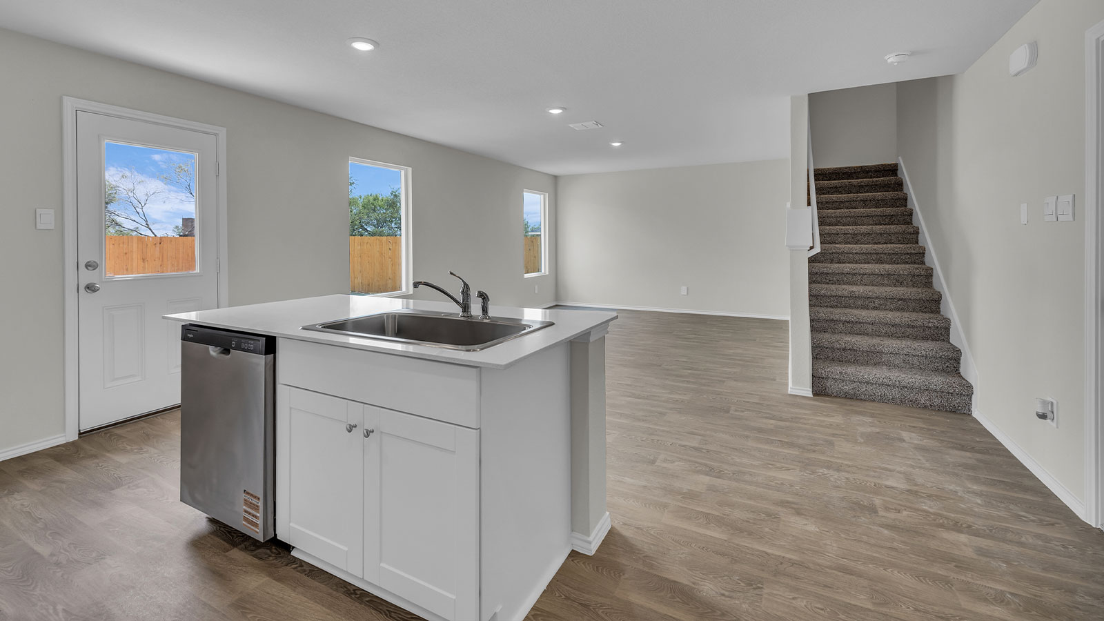 Kitchen island overlooking the dining room and living room.