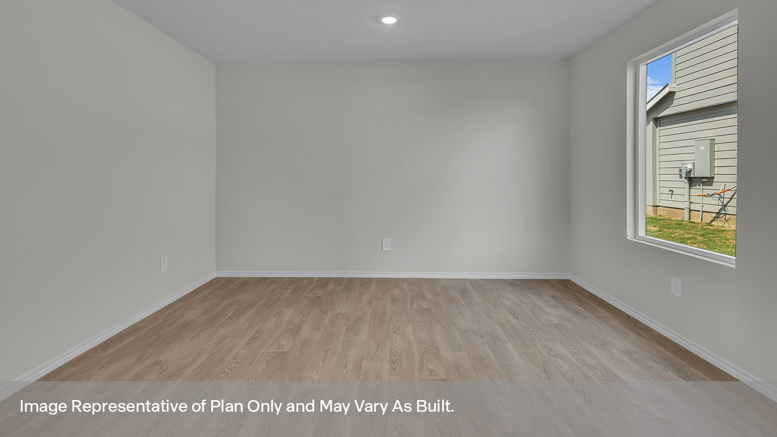 Dining room with vinyl flooring and one window.