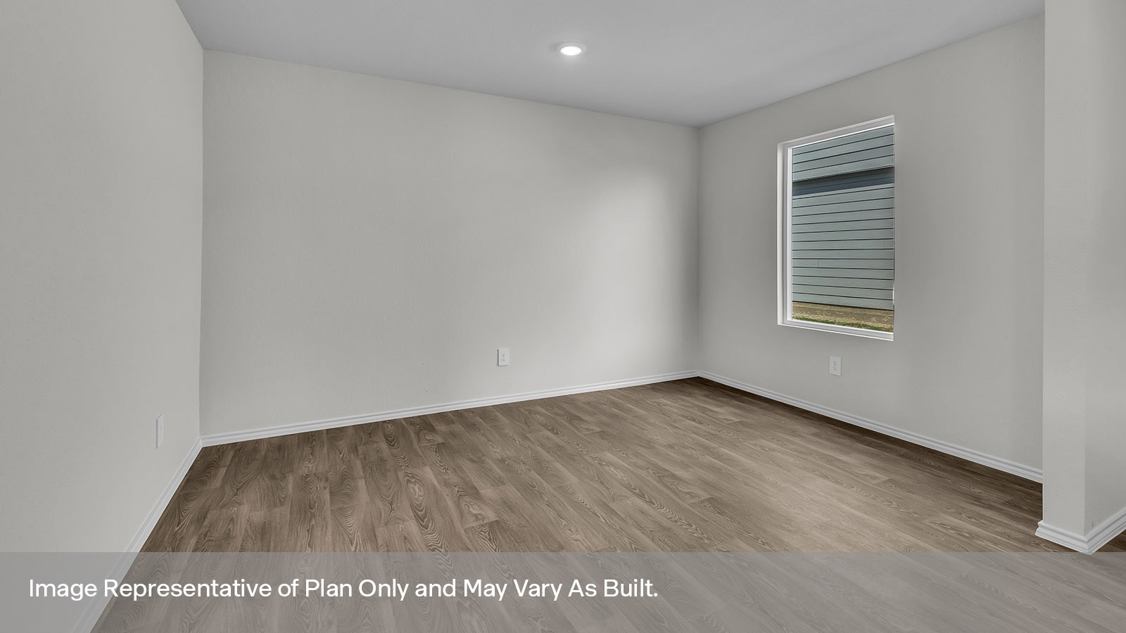 Dining room with vinyl flooring and one window.