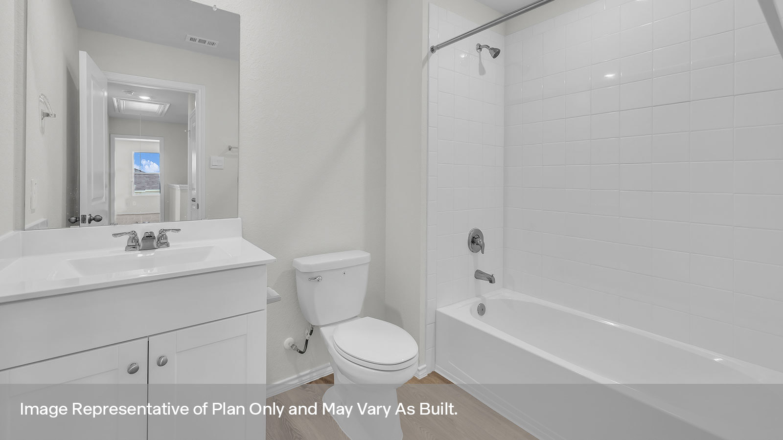 Secondary bathroom with vanity and shower/tub combination.