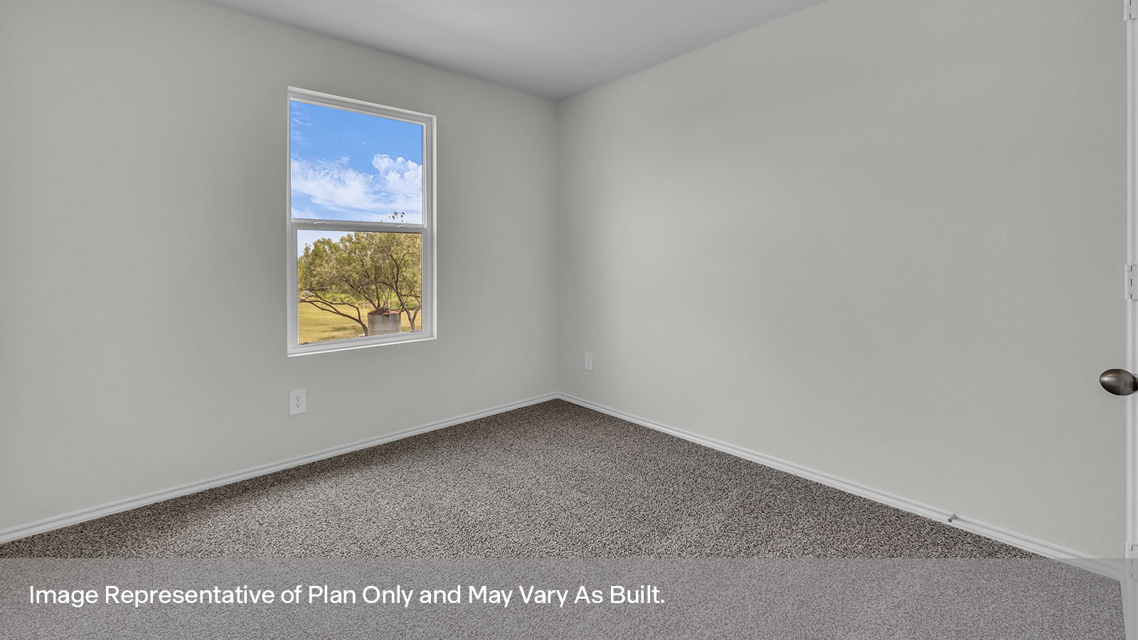Secondary bedroom with carpeting and one window.