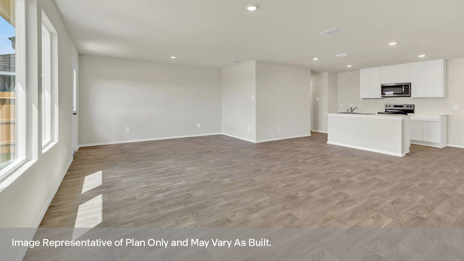 Dining room with vinyl flooring and a half lite exterior door.
