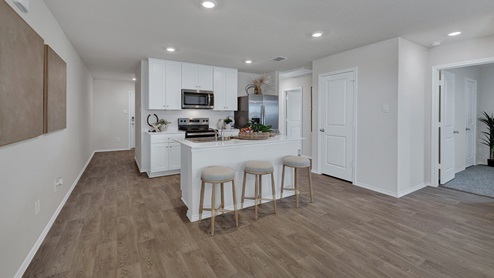 Entry hallway leading to the kitchen.