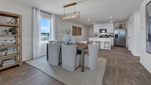 Dining room opening to the kitchen.