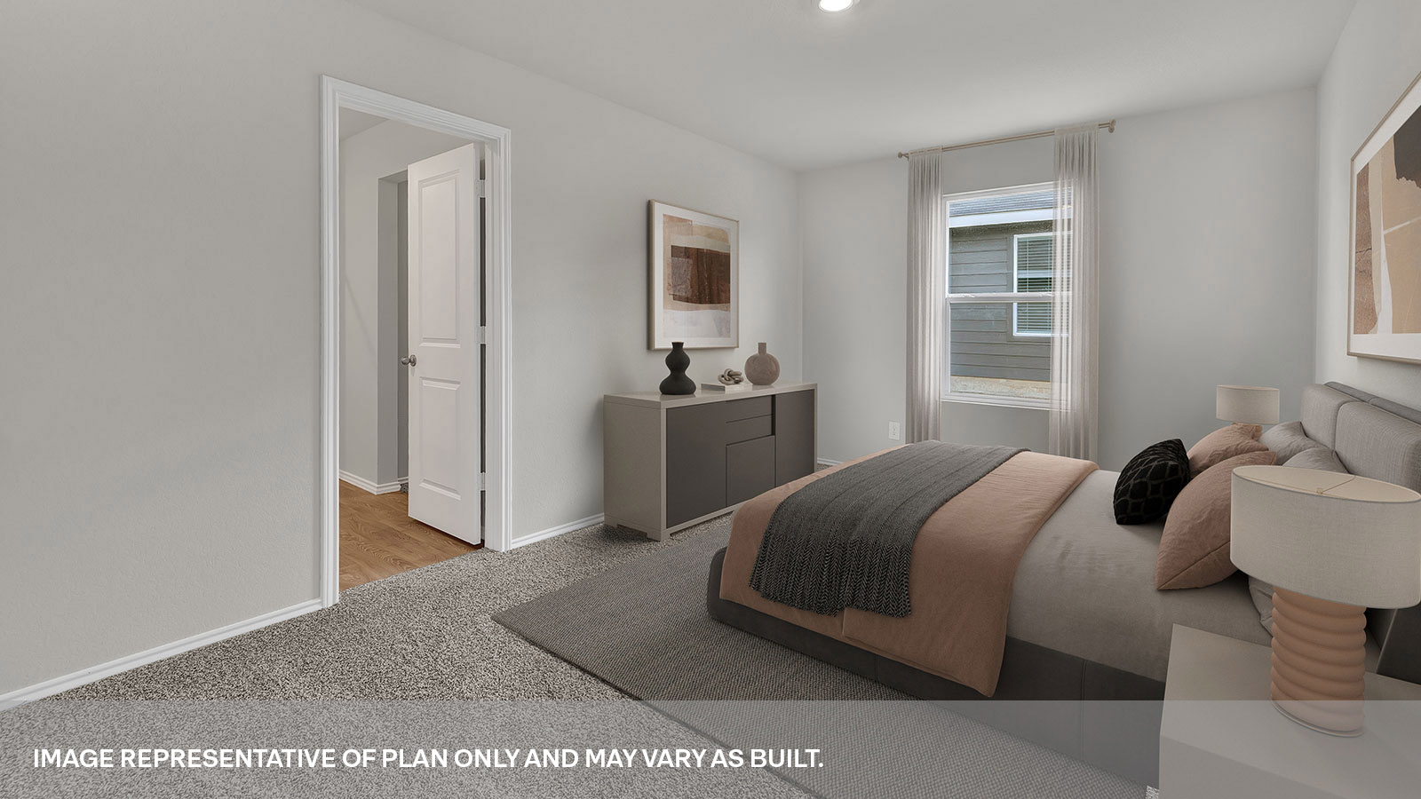 Main bedroom with carpeting and doorway.
