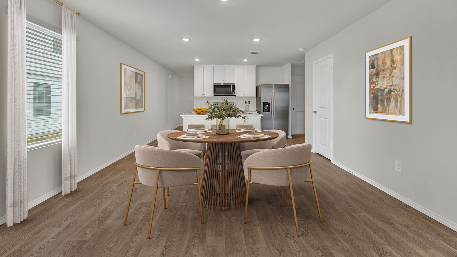 Living room opening to the dining room and kitchen.