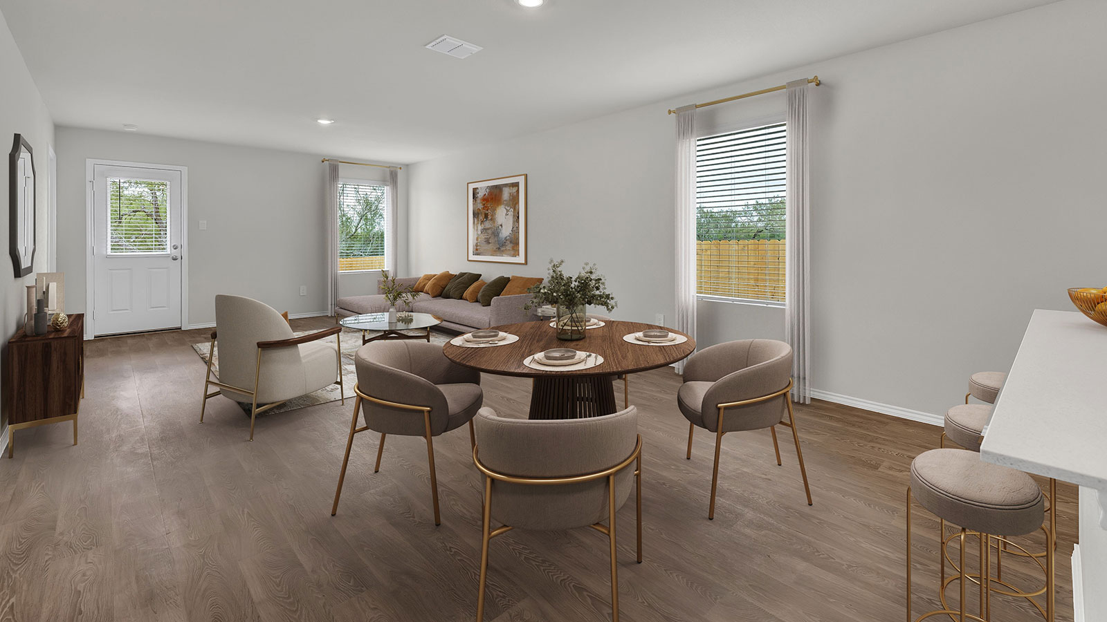 Living room with vinyl flooring, 2 windows, and  half lite exterior door.