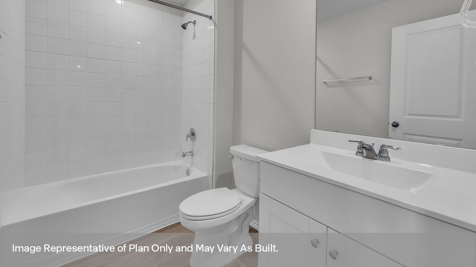 Hall bathroom with single sink, toilet, and tub.