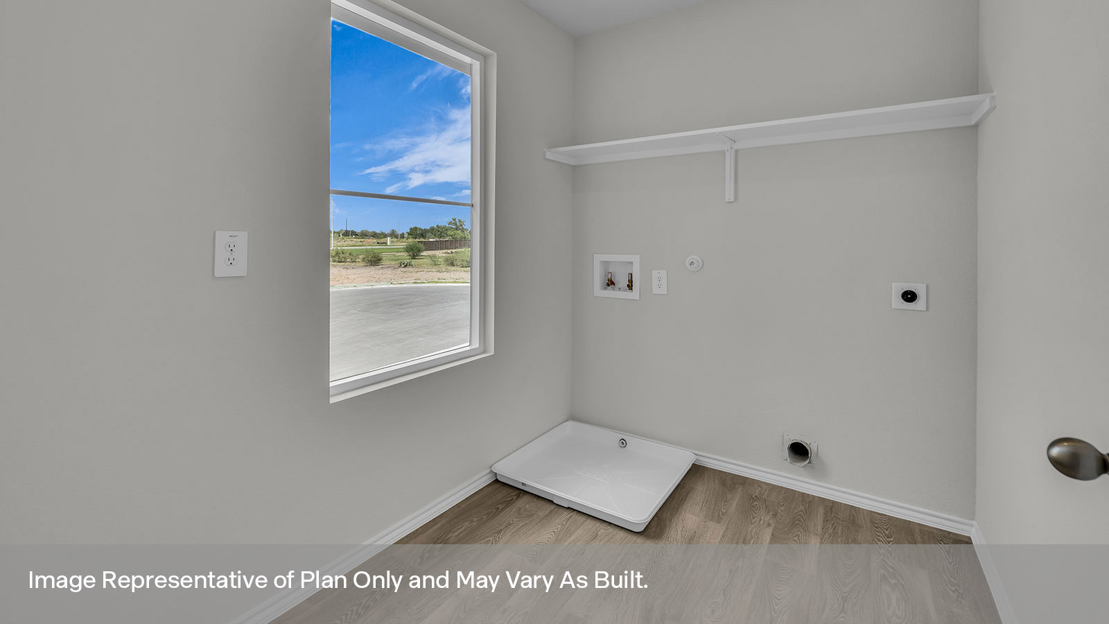 Laundry room with washer/dryer connections and wooden shelving.