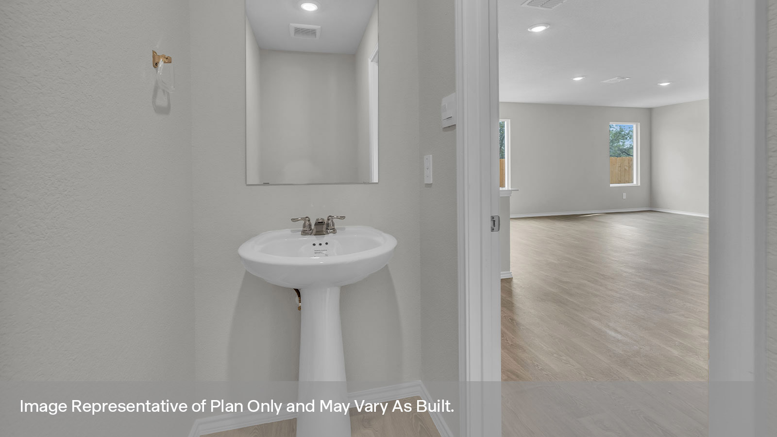 Powder room with pedestal sink.
