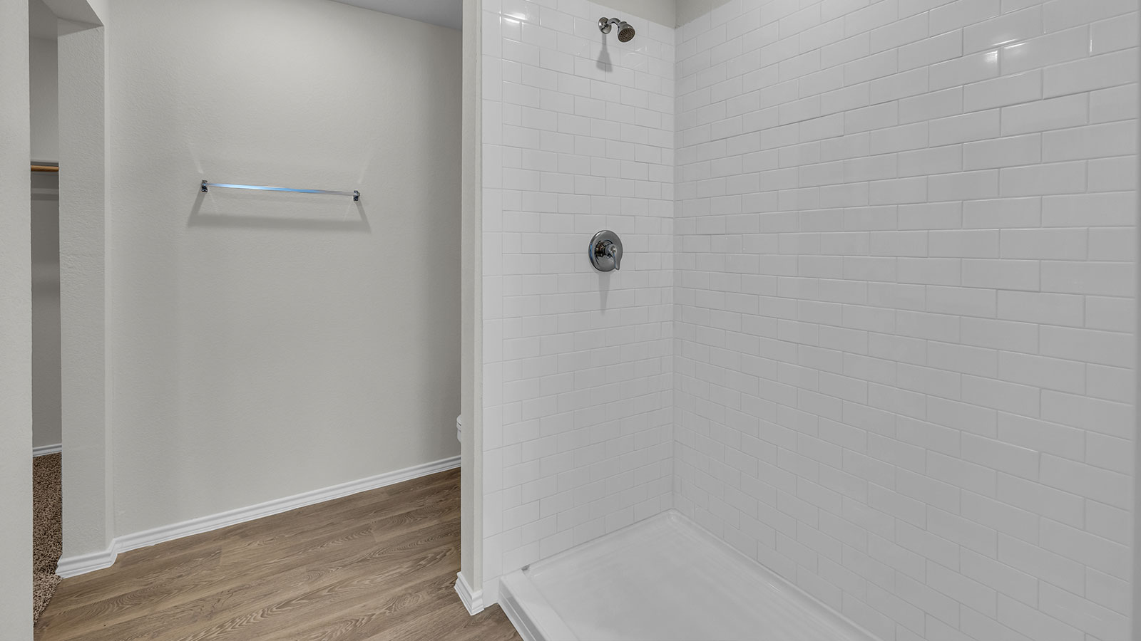 Main bathroom with single sink vanity.