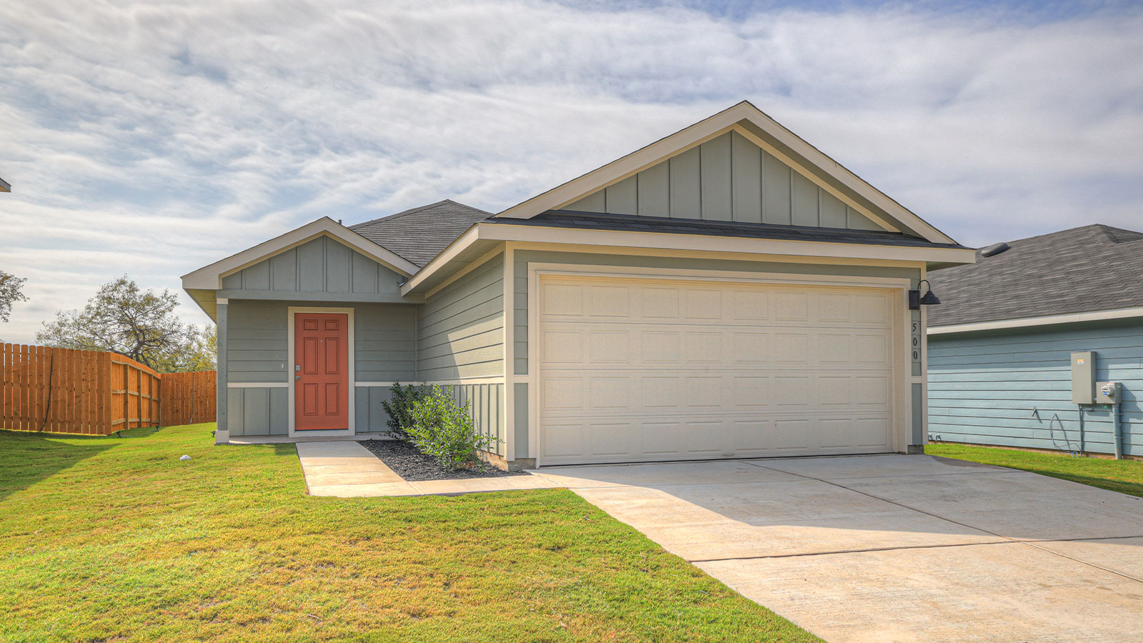 Single-story with farmhouse exteriors.