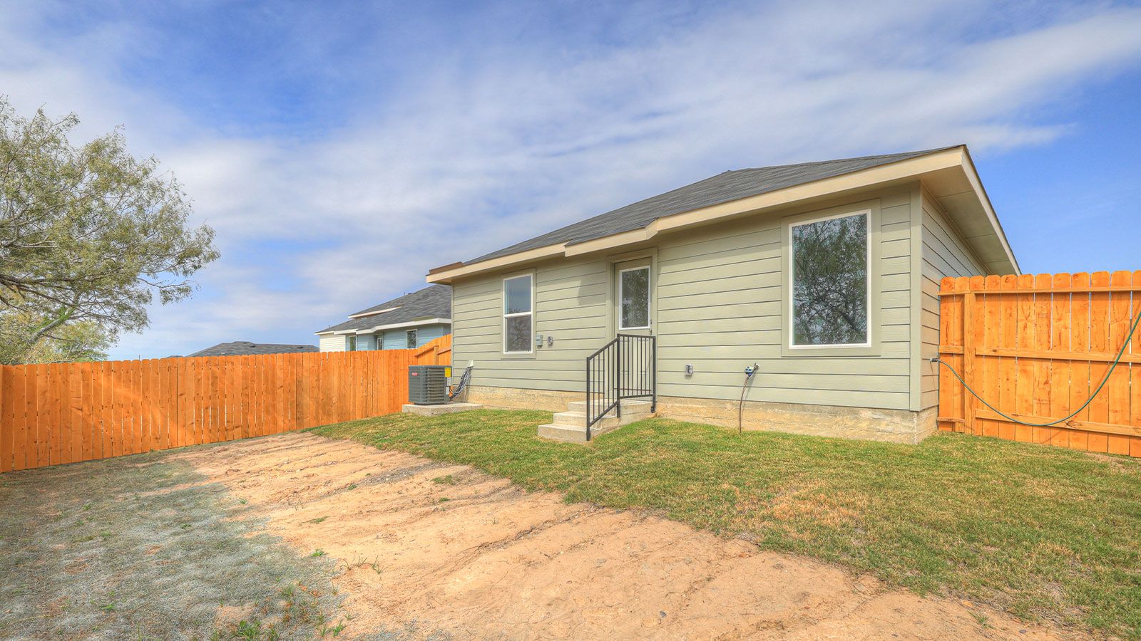 Single-story with farmhouse exteriors.