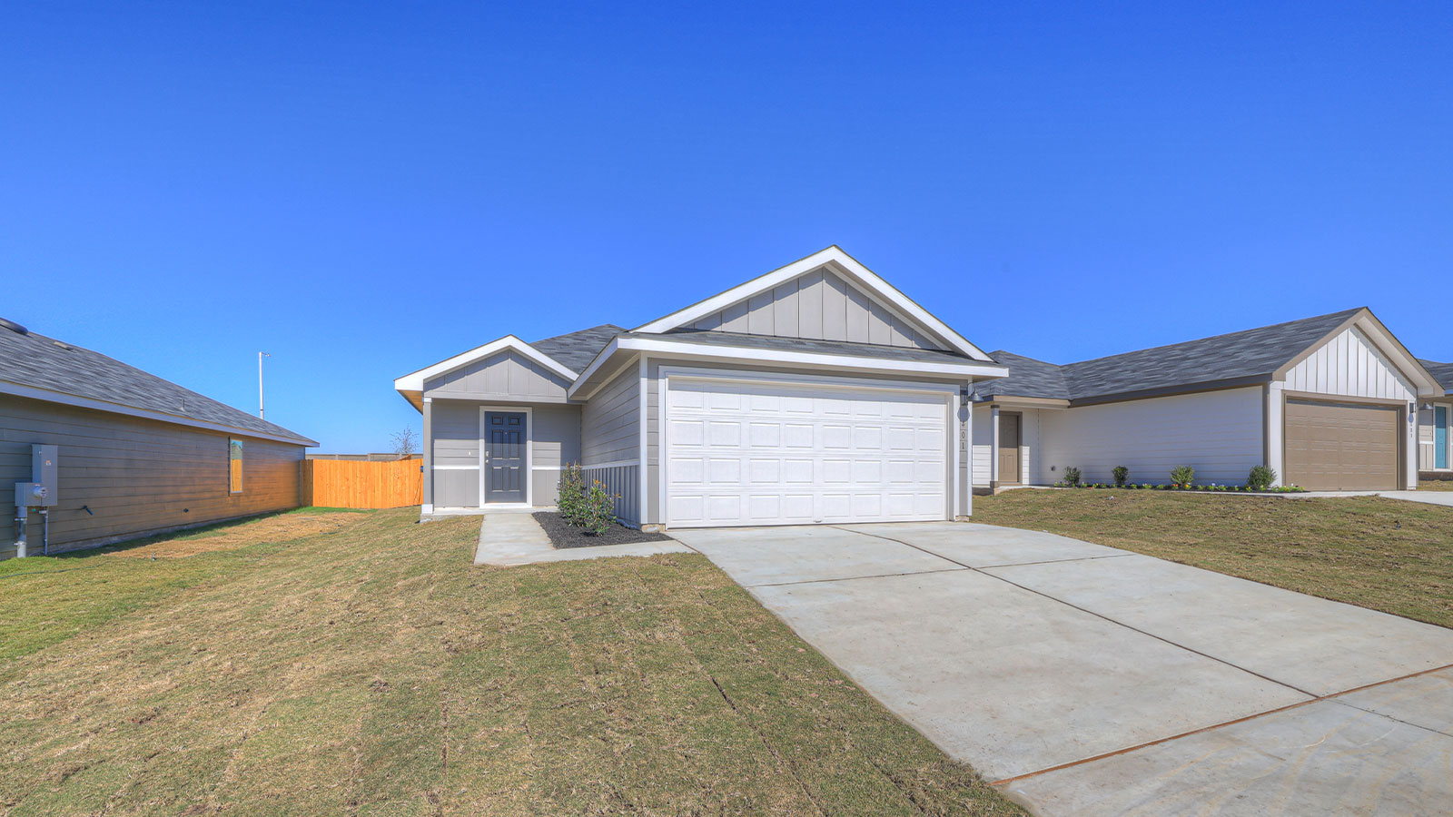 Single-story with farmhouse exteriors.