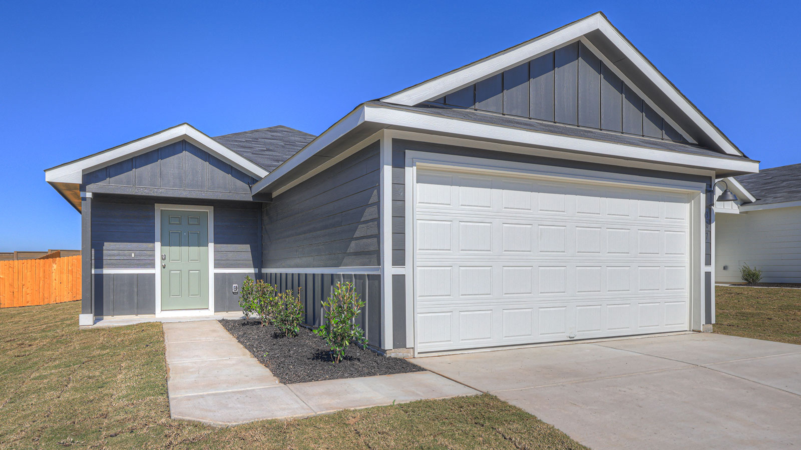 Single-story with farmhouse exteriors.