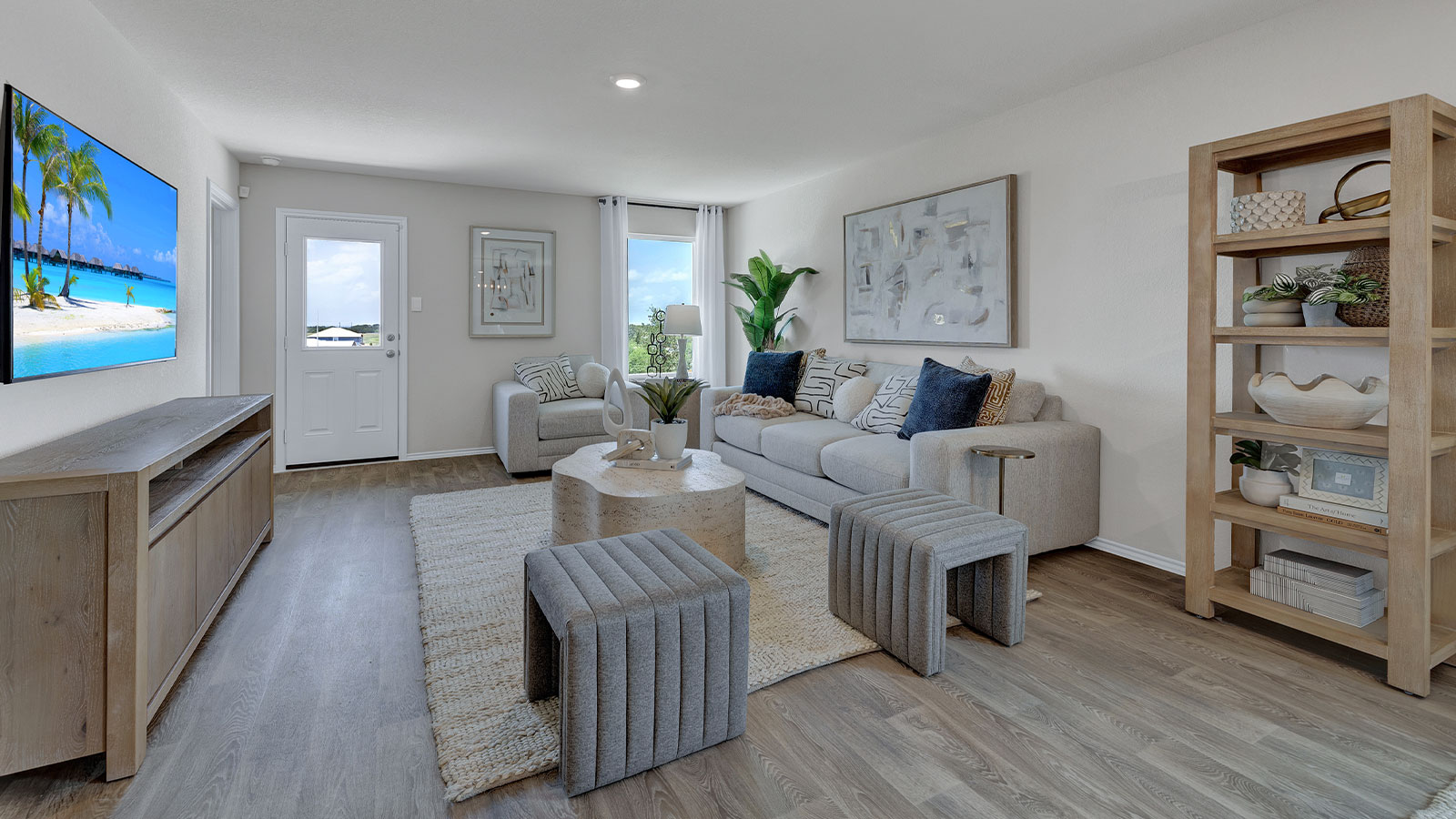 Living room with vinyl flooring and one window.