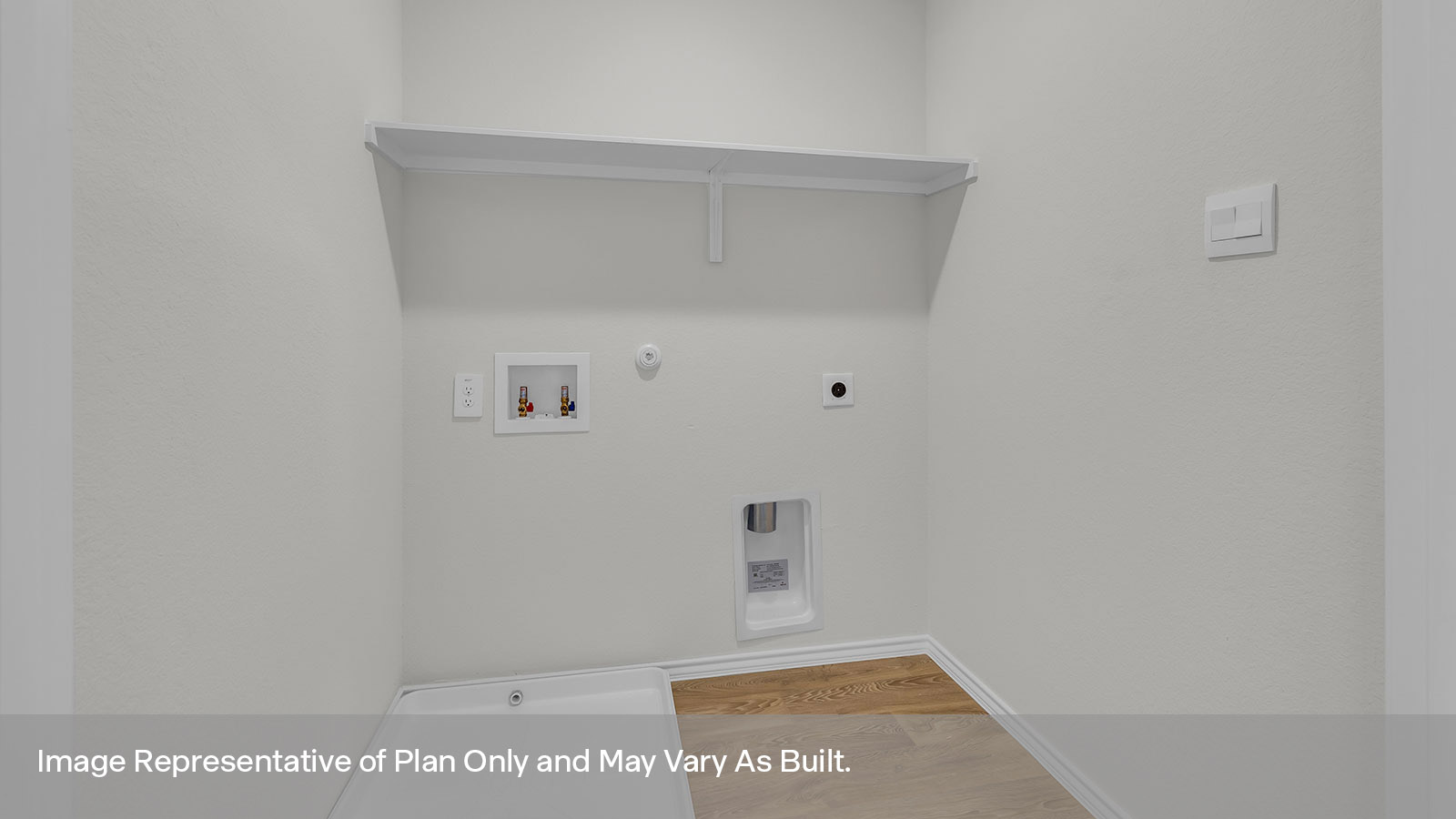 Utility room with washer/dryer connections and wooden shelving.