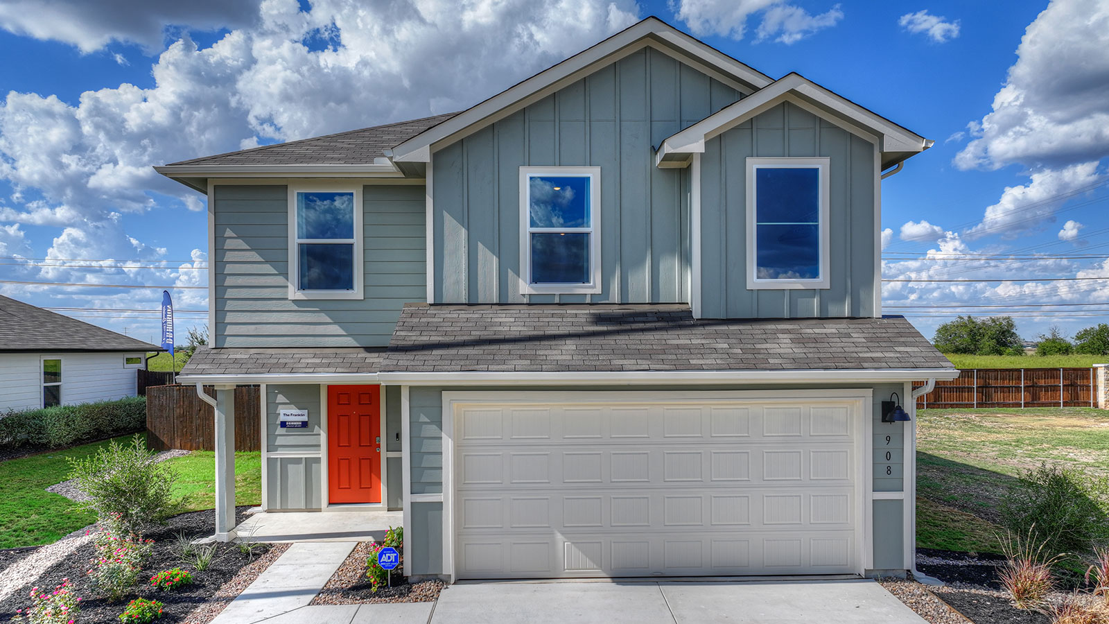 Franklin floorplan with farmhouse exteriors and a 2 car garage.