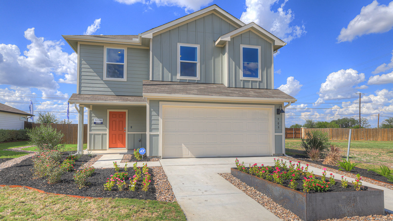 Franklin floorplan with farmhouse exteriors and a 2 car garage.
