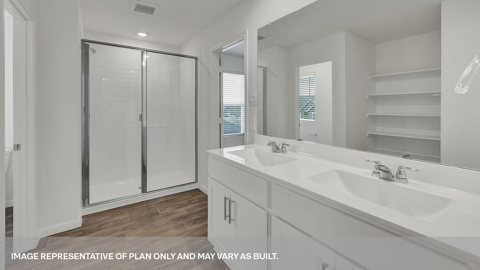 Main bathroom with double sink vanity and stand in shower.