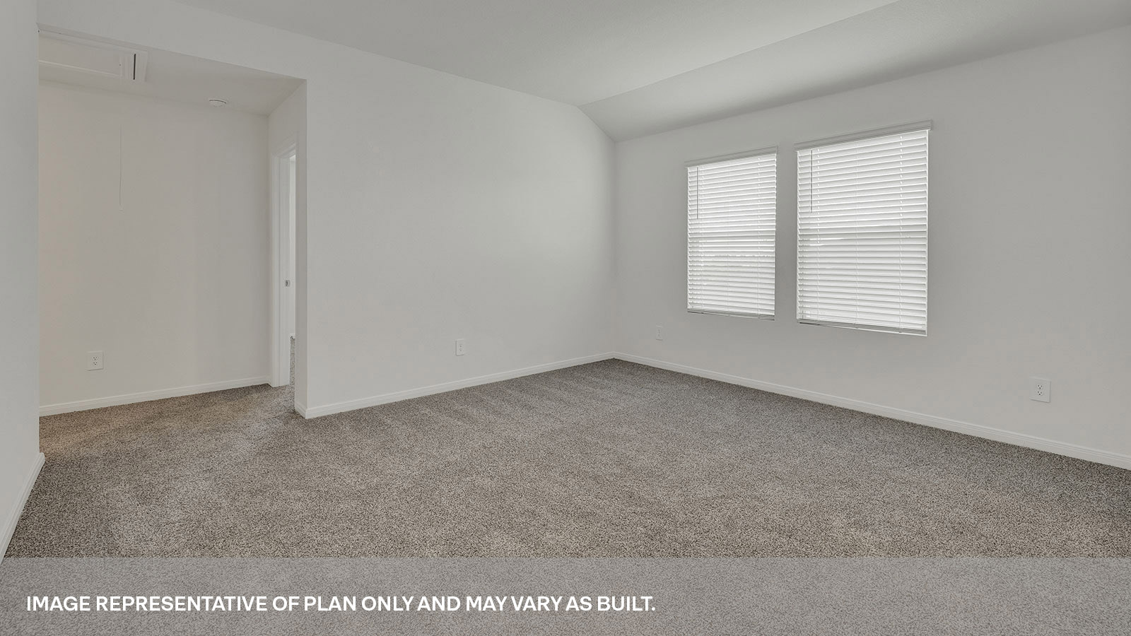 Gameroom with carpeting and bedroom hallway.