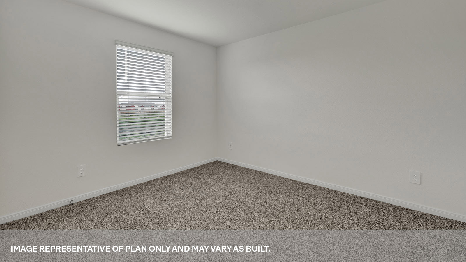 Bedroom with carpeting and one window.