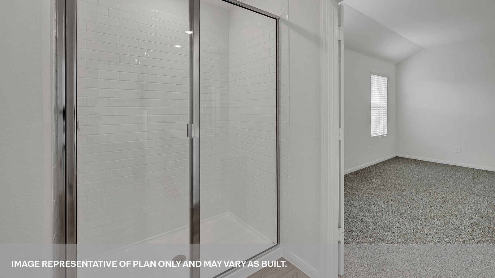 Main bathroom with stand in shower and shower glass door.